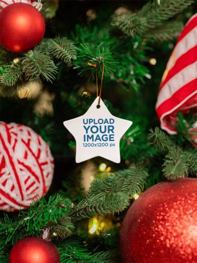 Print Mockup of a Ceramic Star-Shaped Ornament Placed on a Decorated Christmas Tree m52074