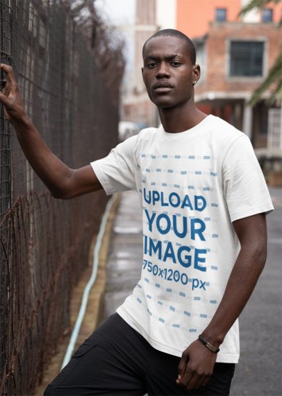 Streetwear-Style Mockup Featuring a Man Wearing a Bella Canvas Tee 