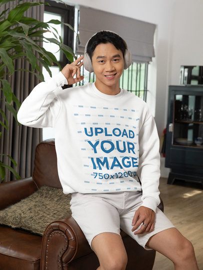 Crewneck Sweatshirt Mockup Featuring a Happy Man in a Coffee House for Lunar New Year m52244