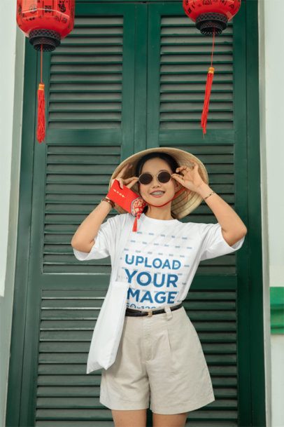 Lunar New Year Mockup of a Smiling Woman Wearing an Oversized T-Shirt m52215