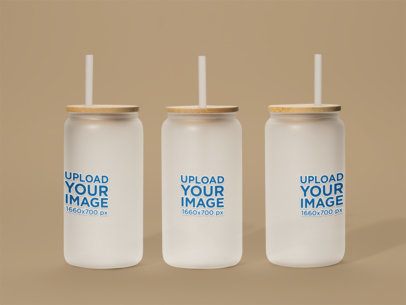 Drinkware Mockup Featuring Three Frosted Libbeys Placed on a Colorful Background m52405
