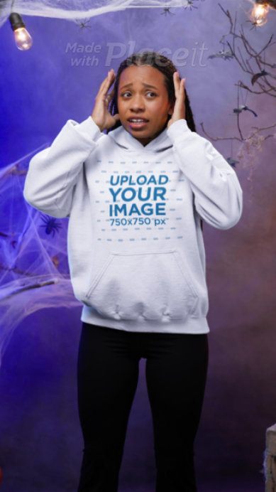 Gildan Sweatshirt Video of a Woman With a Scary Look Standing in a Haunted Setting
