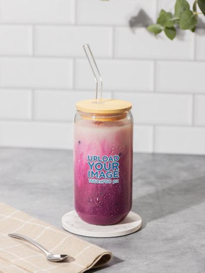 Mockup of a Sipper Glass Can Filled With a  Pink Drink m52422