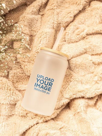 Mockup of a Frosted Libbey Lying in a Cozy Blanket m52437