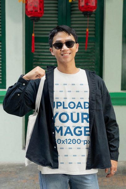 Crewneck Tee Mockup of a Smiling Man Ready to Celebrated the Chinese New Year m52231