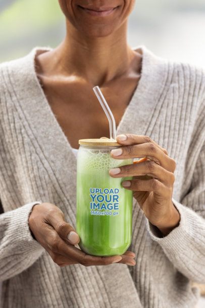 Mockup of a Smiling Cropped-Face Woman Holding a Sipper Can Glass With Matcha m52433