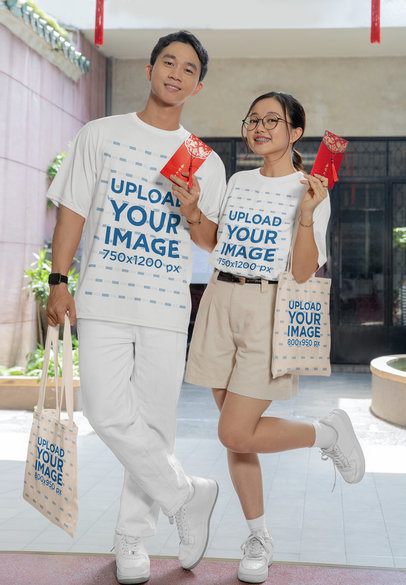 T-Shirt and Tote Bag Mockup of a Couple Holding Red Envelopes to Celebrate the Lunar Year m52207