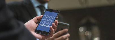 Man Wearing Suit and Using a Black iPhone 6 at a Corporate Environment Mockup