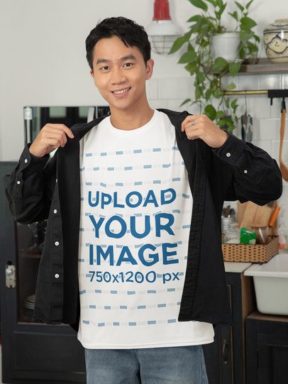 Crewneck T-Shirt Mockup Featuring a Smiling Man Celebrating the Lunar Year at Home m52248