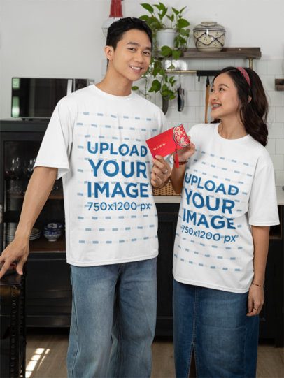 Lunar Year-Inspired T-Shirt Mockup of a Man Gifting a Red Envelope to His Girlfriend m52247