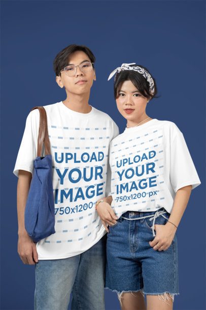 Mockup Featuring Two Teenagers Standing Next to Each Other in a Studio