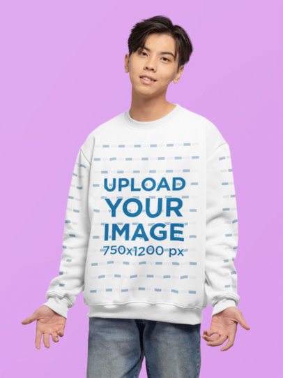 Mockup of a Happy Teenage Boy Wearing a Sweatshirt with Customizable Sleeves