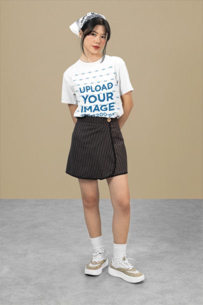 Mockup Featuring a Shy Teenage Girl Wearing a T-Shirt in a Studio m51438