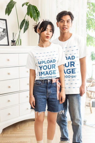 Mockup Featuring Two Teenagers Wearing Matching T-Shirts at Home