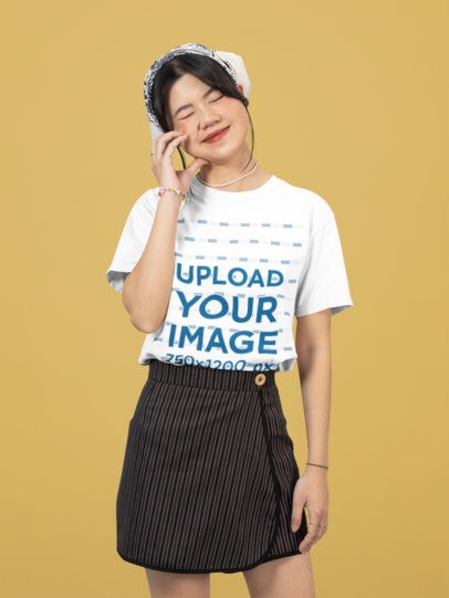 Rounded-Neck Tee Mockup Featuring a Teenage Girl Standing in a Studio