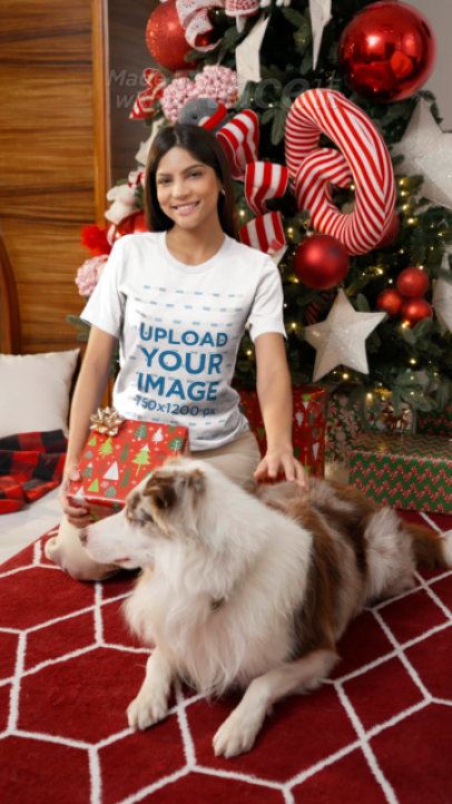 Bella Canvas T-Shirt Video of a Woman Petting Her Dog in a Xmas-Decorated Living Room 9016v