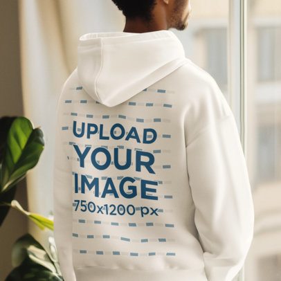 Back-View Mockup Featuring an AI-Generated Man Wearing a Pullover Hoodie