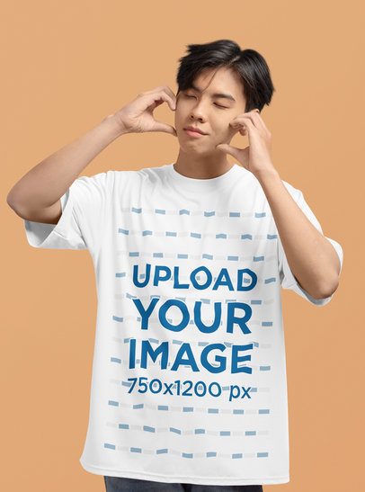 Crewneck T-Shirt Mockup of a Teenager Making a Heart Sign with His Hands m51423