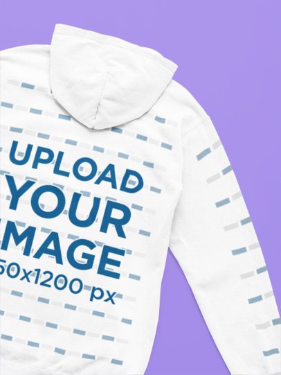 Back-View Mockup of a Comfort Colors Hoodie Placed on a Colorful Surface m52748