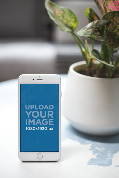Silver iPhone 8 Plus Mockup with a Plantpot a21618
