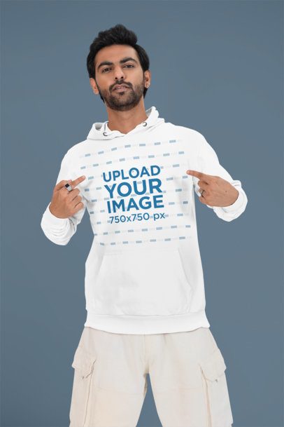Studio Mockup Featuring a Bearded Man Pointing at His Pullover Hoodie m53083