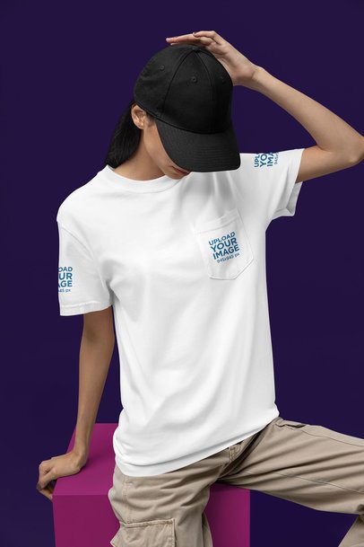 Comfort Colors Pocket Tee Mockup of a Woman Sitting on a Colorful Cube in a Studio m52983