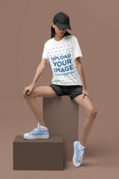 Simple Mockup of a Woman Wearing a Comfort Colors T-Shirt in a Studio m53015