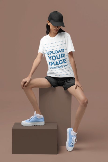 Simple Mockup of a Woman Wearing a Comfort Colors T-Shirt in a Studio