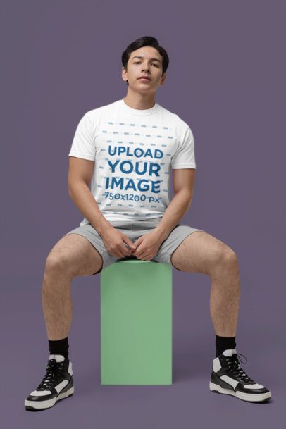 Comfort Colors T-Shirt Mockup Featuring a Serious Man Sitting a Colorful Cube m53017