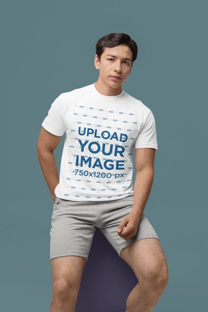 Comfort Colors Tee Mockup of a Serious-Looking Man Sitting on a Cube m53018