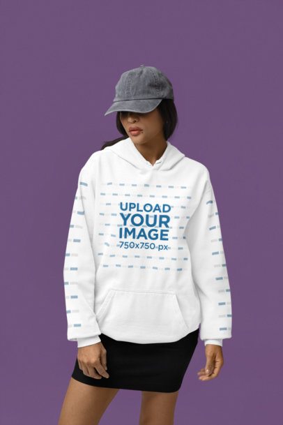 Mockup Featuring a Woman Posing in a Studio Wearing a Comfort Colors Hoodie m53152