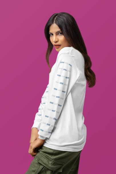 Mockup of a Woman Posing in a Studio With a Long-Sleeve Tee by Comfort Colors in a Studio m53173