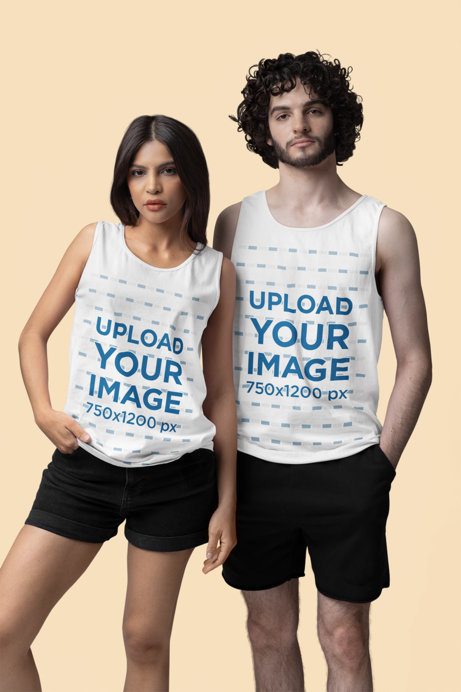 Comfort Colors Tank Top Mockup of a Serious Couple Posing in a Studio