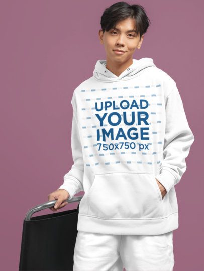 Pullover Hoodie Mockup Featuring a Smiling Teenage Boy Posing in a Studio m51437