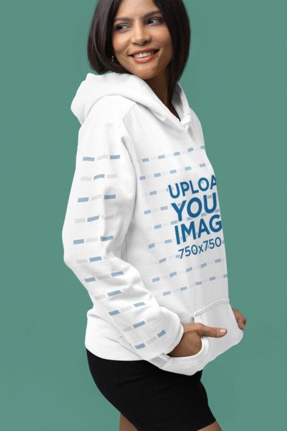 Comfort Colors Mockup Featuring a Happy Woman in a Hoodie With a Customizable Sleeve  m53147