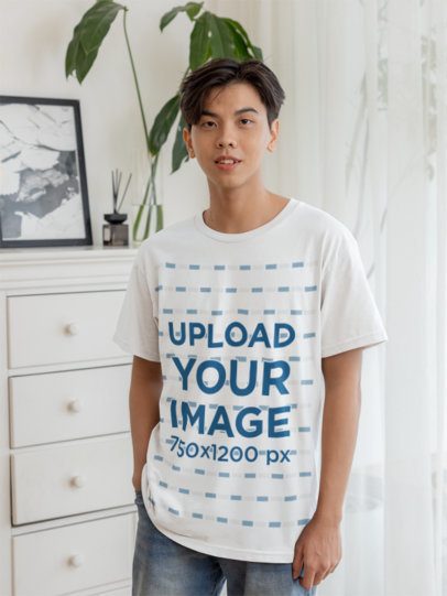Round-Neck T-Shirt Mockup of a Teenage Boy Posing in His Bedroom m51475