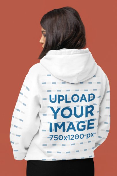 Back-View Mockup of a Woman Wearing a Comfort Colors Hoodie With Customizable Sleeves in a Studio m53151