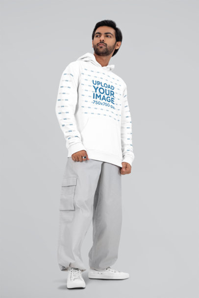 Pullover Hoodie Mockup of a Serious Bearded Man Standing Against a Customizable Background