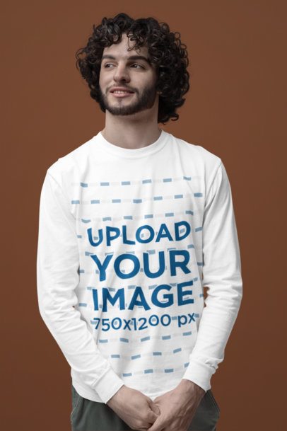 Mockup of a Happy Man Wearing a Long-Sleeve Tee By Comfort Colors in a Studio m53189