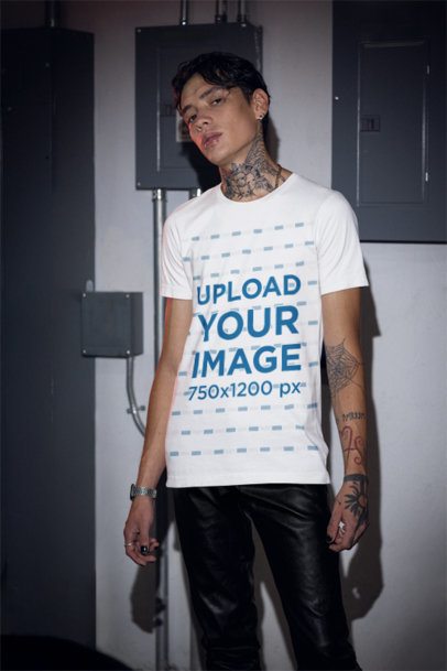 Gothic-Styled Mockup of a Tattooed Man in a Bella Canvas Round-Neck T-Shirt