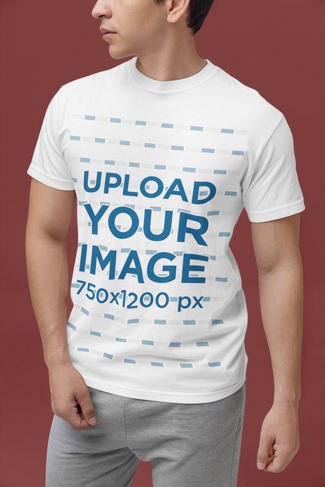 Mockup of a Cropped-Face Man in a Studio Wearing a T-Shirt by Comfort Colors