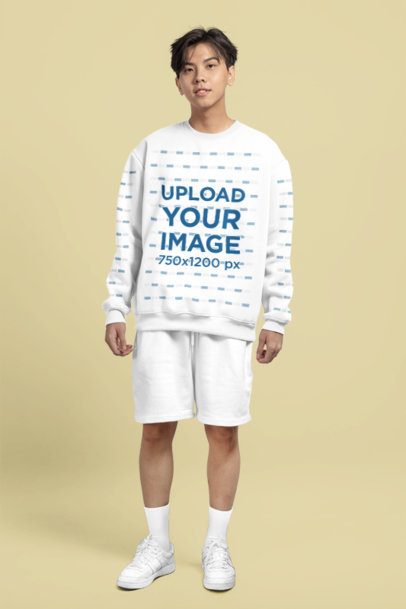 Crewneck Sweatshirt Mockup of a Teenage Boy Posing With a Smiley Look in a Studio