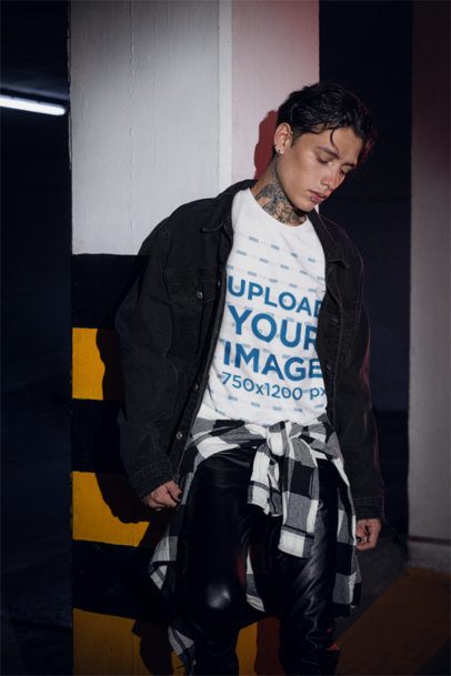 Bella Canvas T-Shirt Featuring a Man With Tattoos and Gothic Look Posing in a Parking Lot