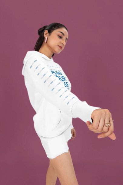 Mockup of a Woman Wearing a Hoodie With a Customizable Sleeve and Rings on Her Hand m53080