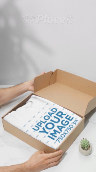 Apparel Video Featuring a Person Opening a Box With Gildan Sweatshirt 9028v