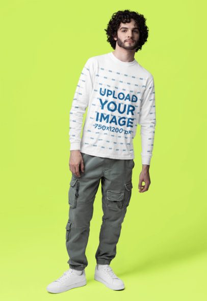 Comfort Colors Mockup Featuring a Man in a Long-Sleeve Tee Standing in a Colorful Background m53184