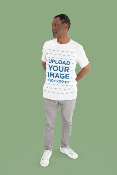 Bella Canvas T-Shirt Mockup of an Elderly Man Standing in a Customizable Background