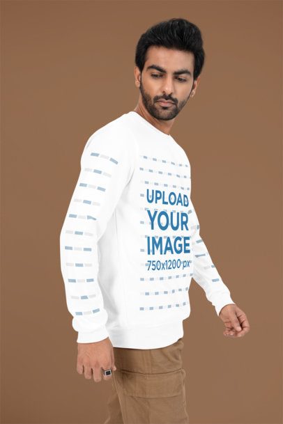 Bella Canvas Long-Sleeve Tee Mockup of a Bearded Man Wearing a Dark Ring in a Studio