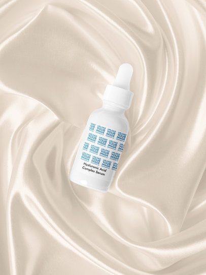 Hyaluronic Acid Complex Serum Mockup Featuring a Silk Texture Background m53602