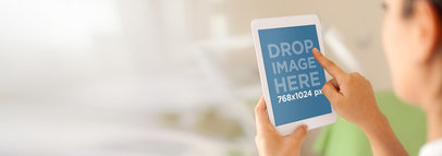 Mockup of a Spa Therapist Using an iPad Mini